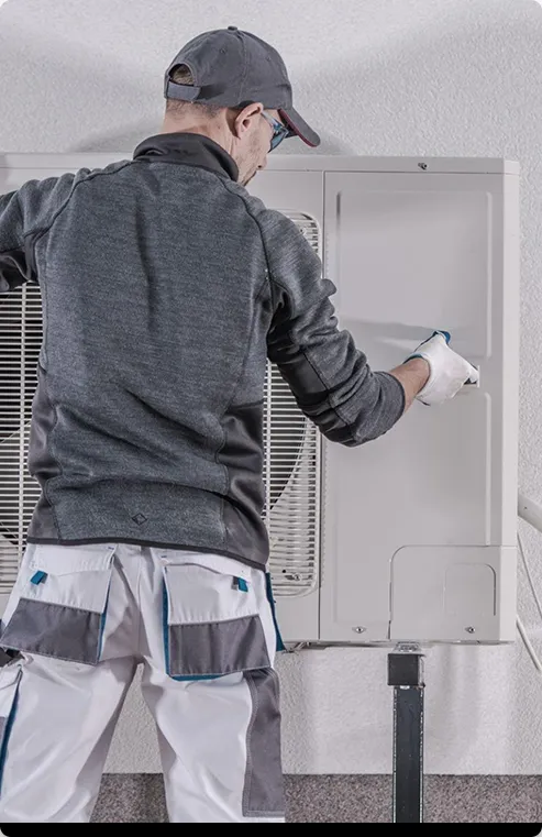 Shipton worker installing a heat pump