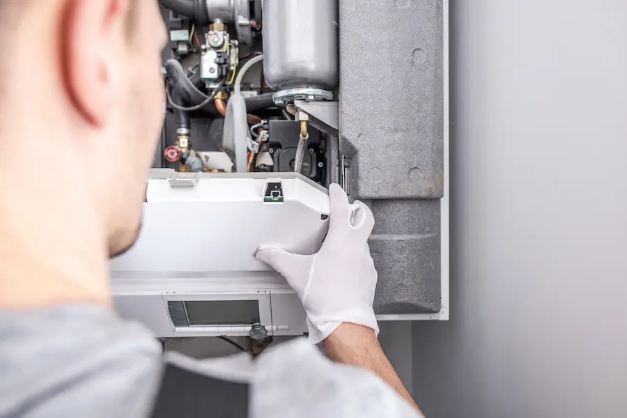 contractor-repairing-central-heating-furnace-syste