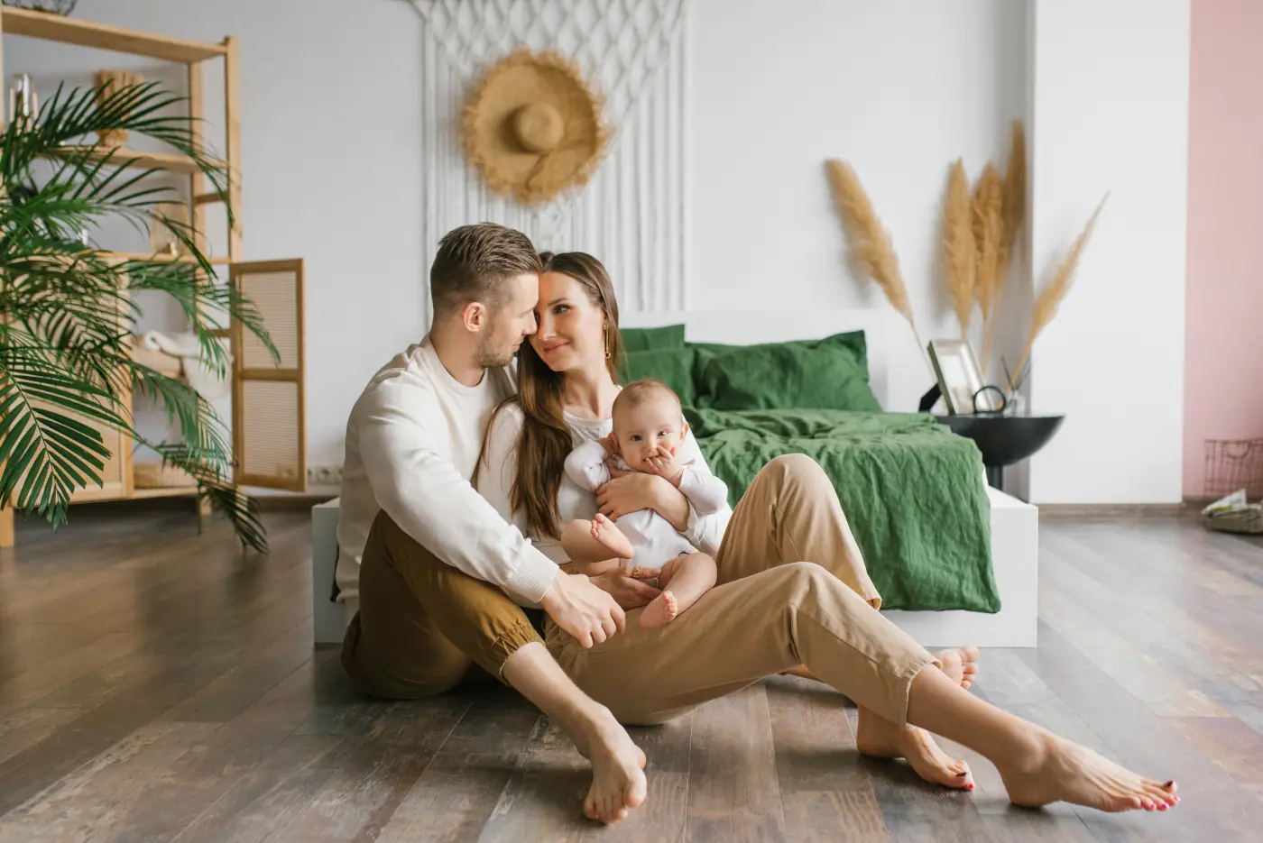 happy couple with their baby