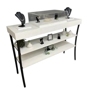 Two-tier accessory display with a black top and white shelves