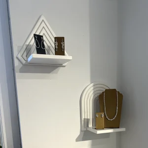 White wall shelf and jewelry display stand