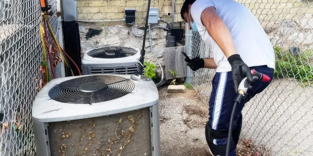 HVAC Technician doing AC Maintenance