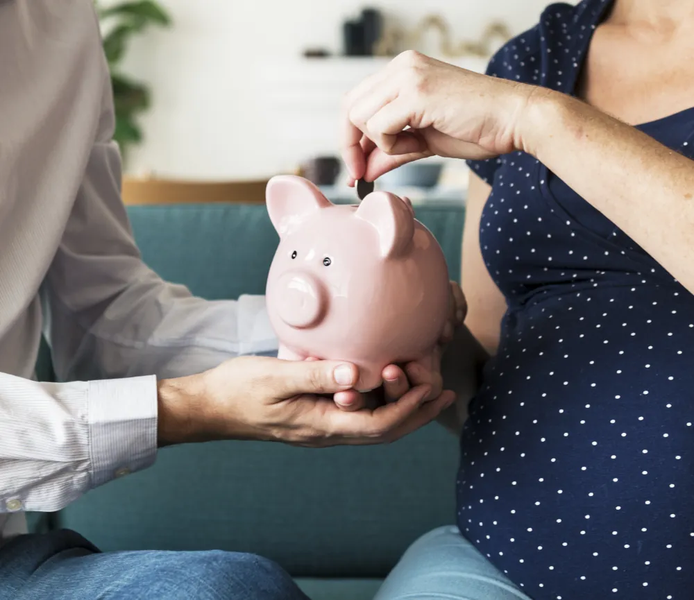 Offers - Family saving money in piggy bank.