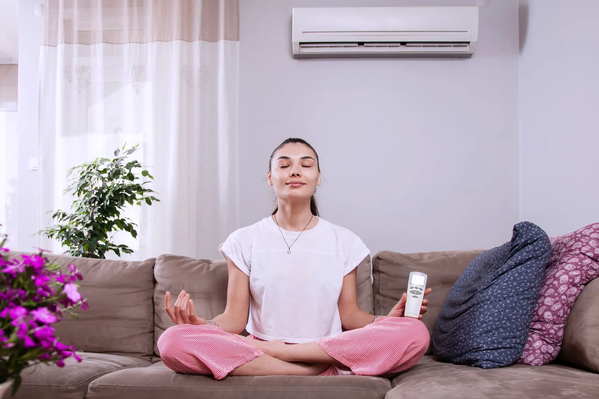 woman in the living room with ac