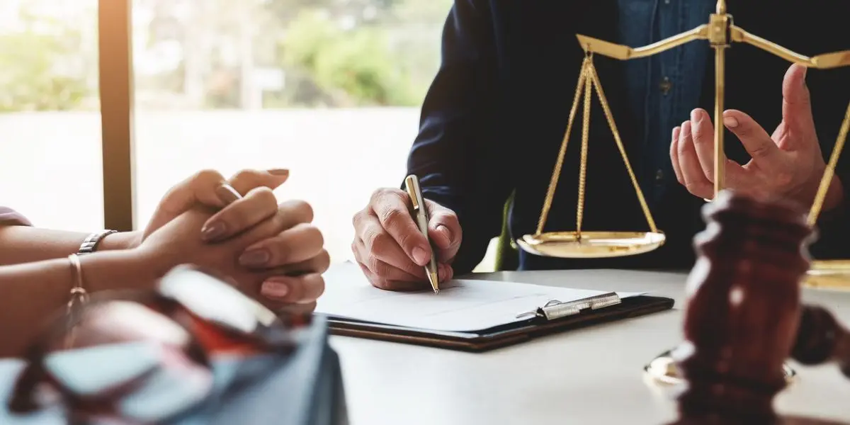 Parent meeting with a personal injury attorney to discuss filing a legal claim on behalf of an injured child | Filing a Personal Injury Claim on Behalf of a Child