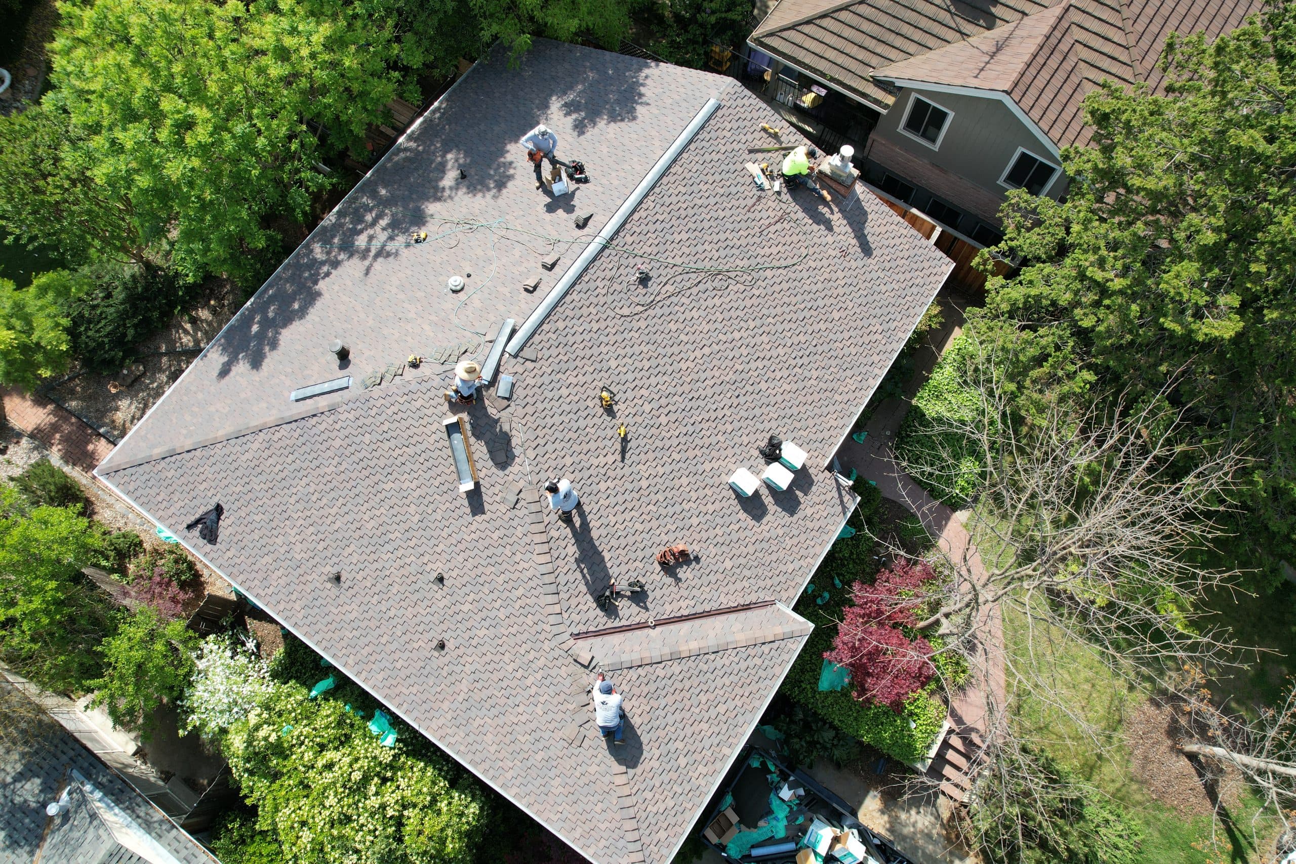 TSD Construction roofing crew installing new roof in Sacramento