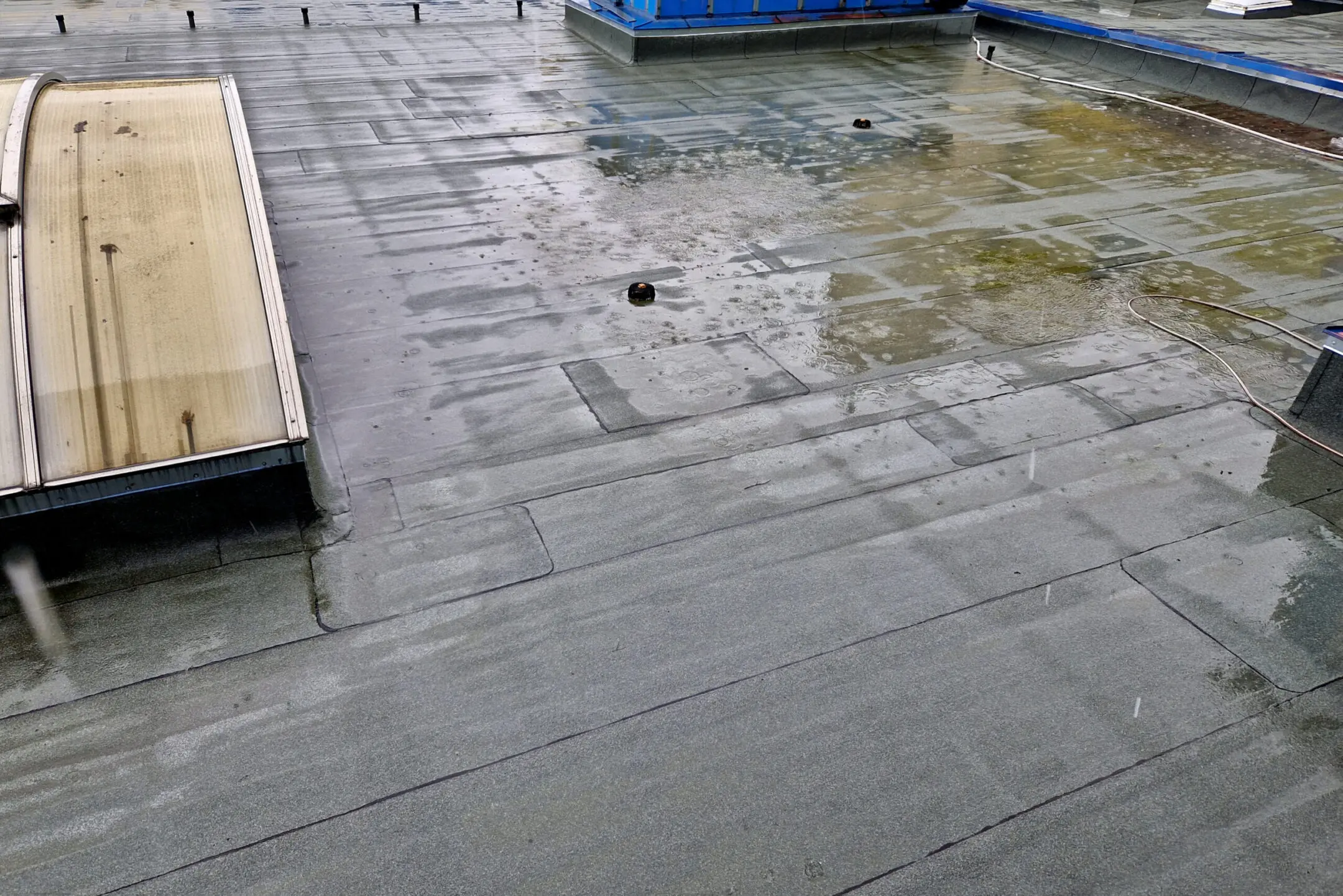 flat roof flooded (flat roof leak repair 2026)