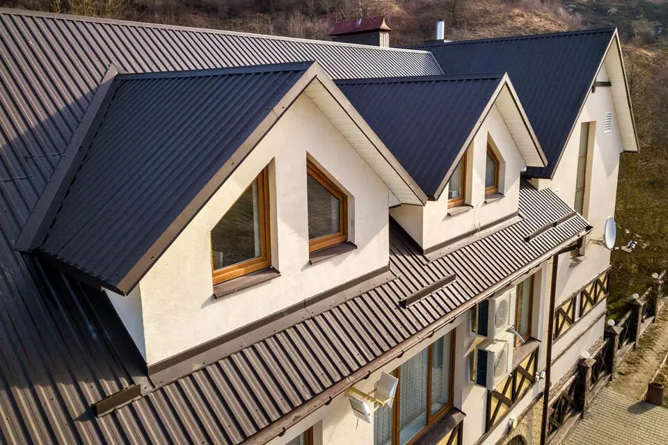 metal roofing bigfork mt-brown corrugated metal roofing on a white rustic home