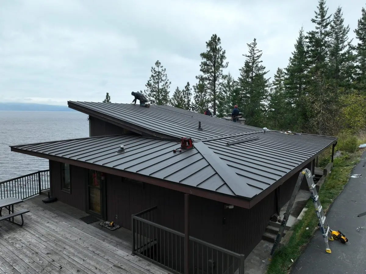 are metal roofs better small house guy on top of metallic roof