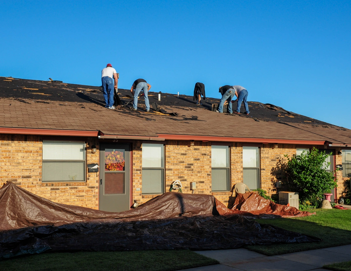 crew working on the house roof
