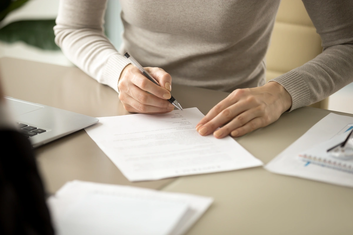 homeowner signing a warranty