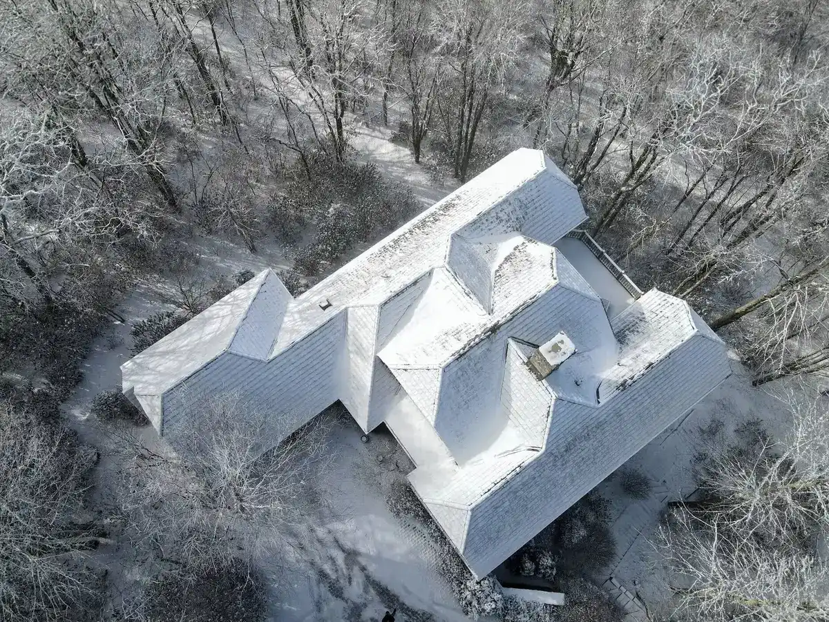 snowy roofing storm damage copy