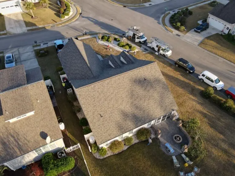 a house with a brown asphalt shingle roof