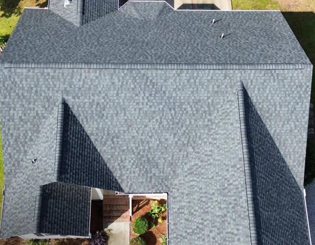drone view of a dark grey shingle roof