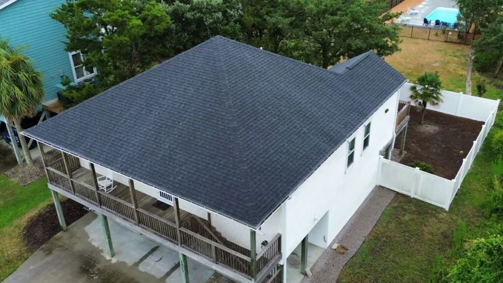 roof repair cost white house blue shingles roof