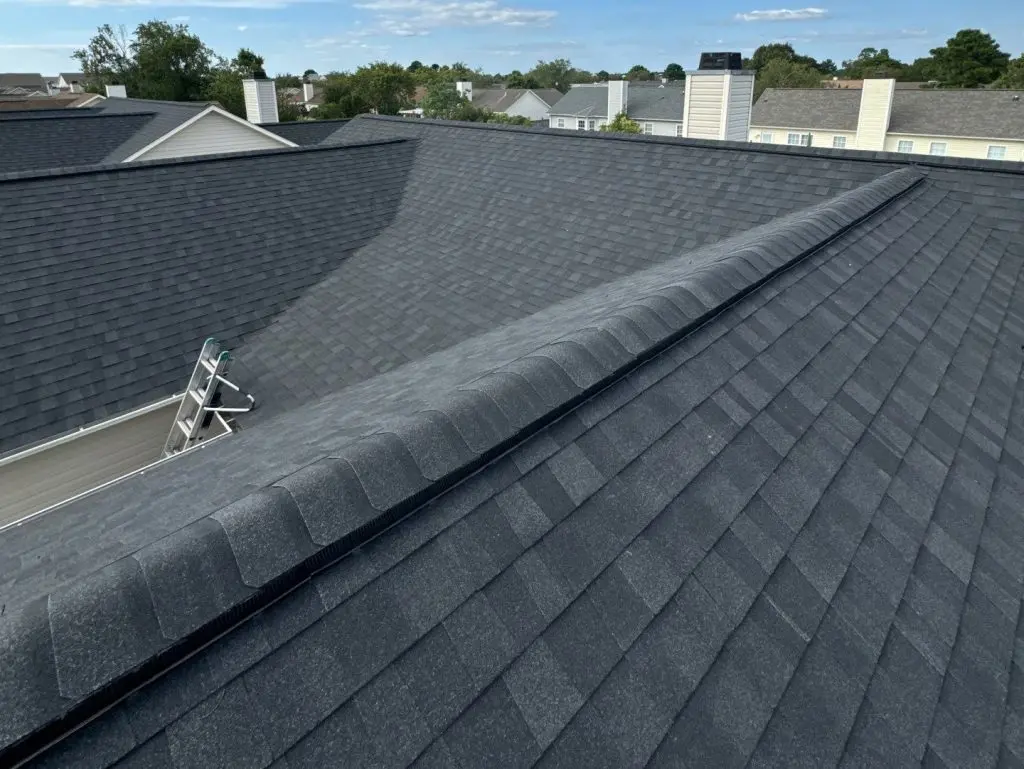 grey shingles roof blue sky