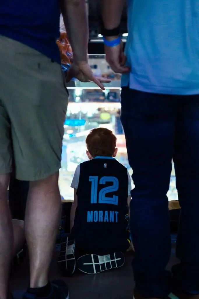 boy in Ja Morant jersey at Grizzlies game