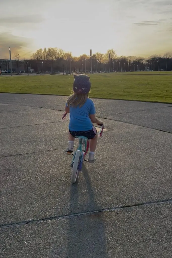 girl wobbling on a bike