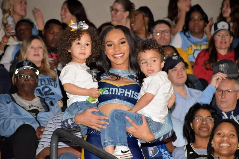 Grizz girl holding kids