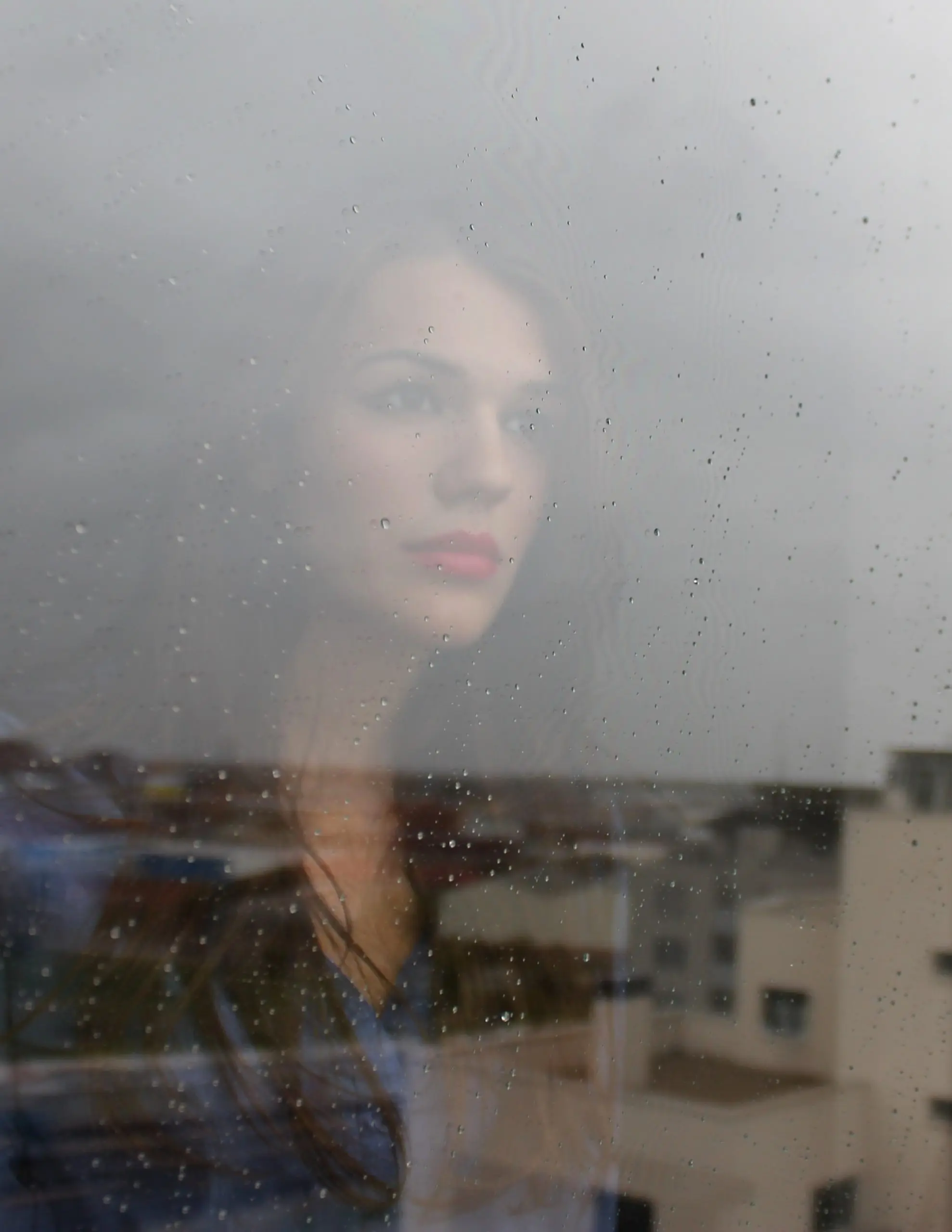 vulnerable woman in the window