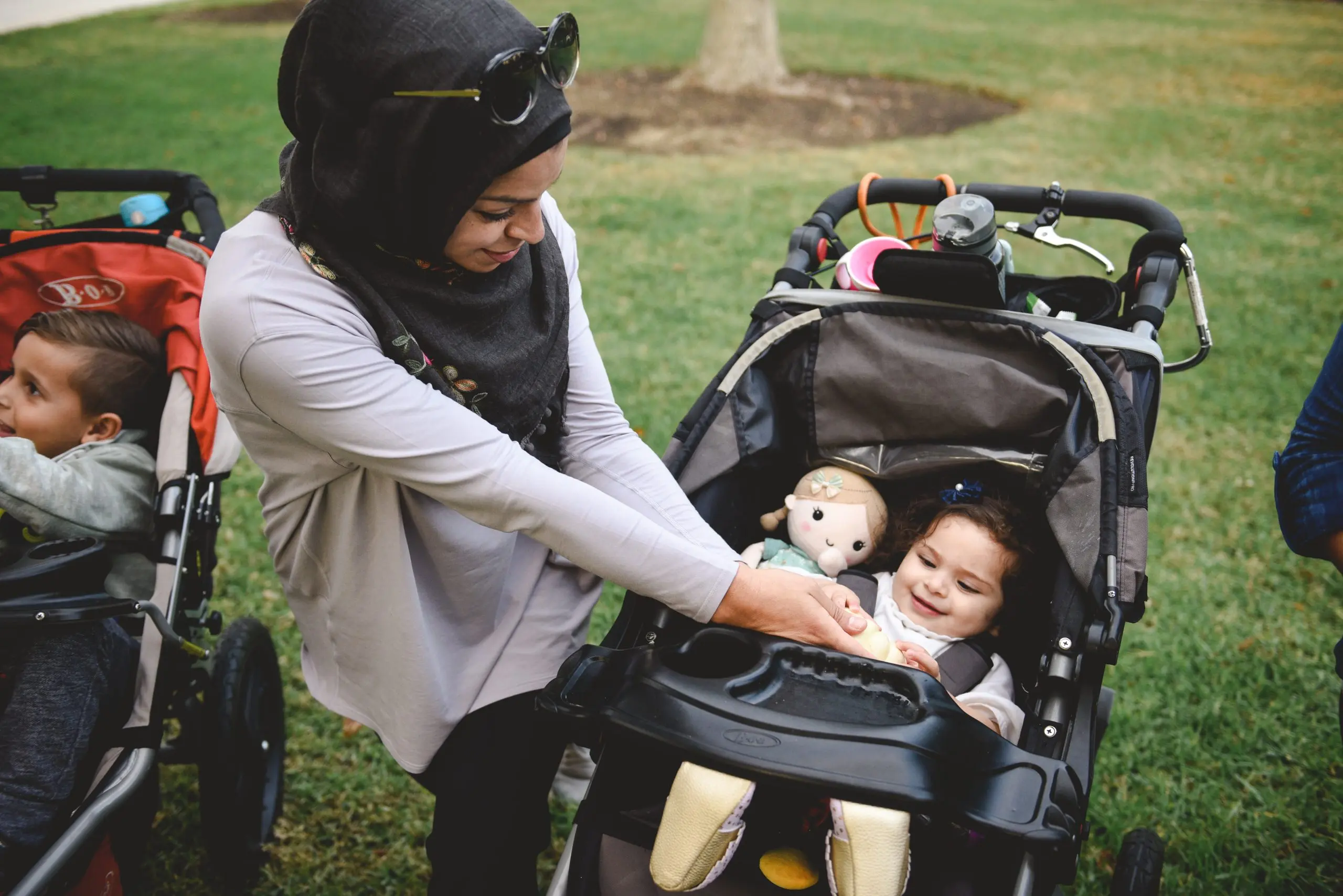 woman at an exercise class with her baby
