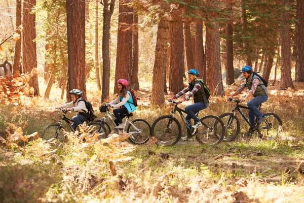 family movement fun biking together in winter