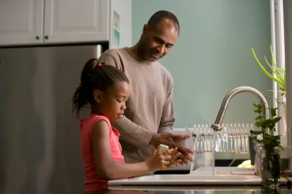 dad with daughter teaching her about how to deal with stress