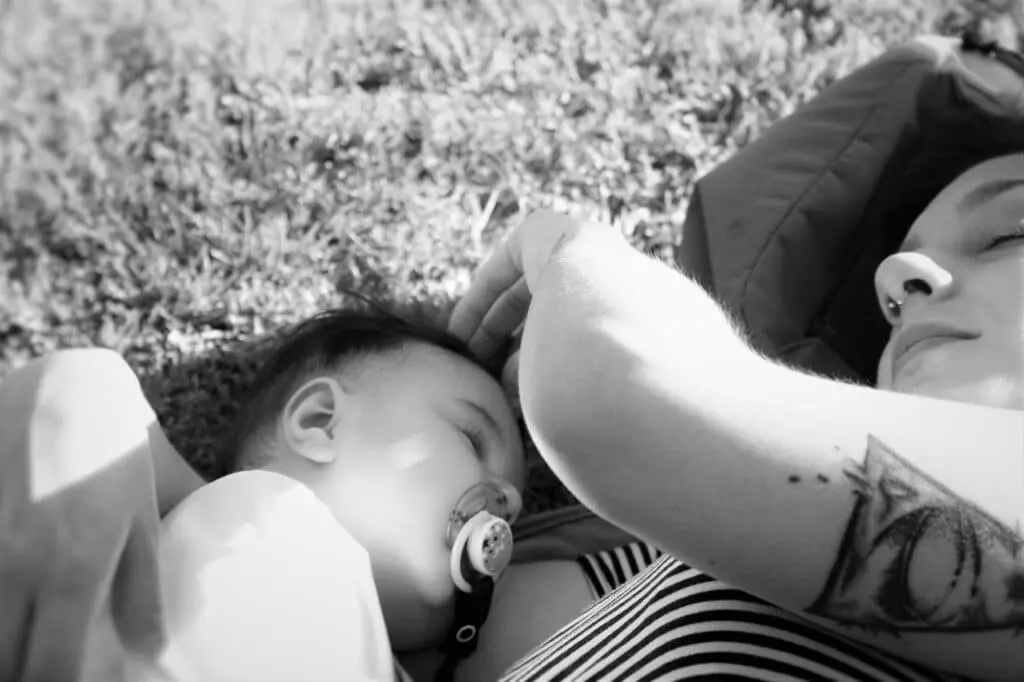mom napping with her toddler