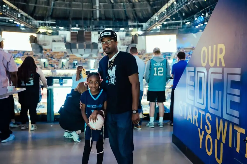 father and daughter at Grizzlies game