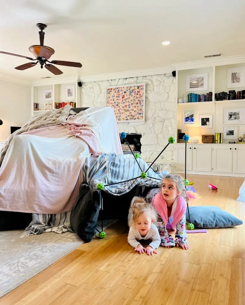messy fort in the living room that kids made