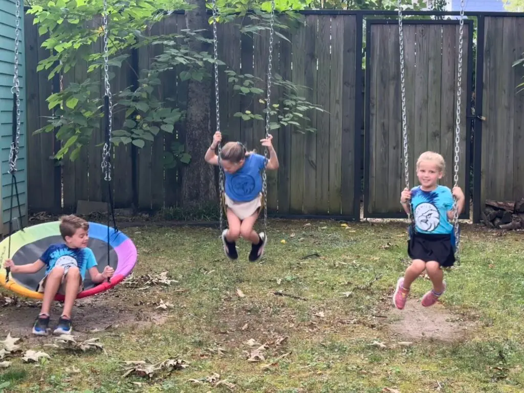 swinging in the backyard before school means we'll probably be late