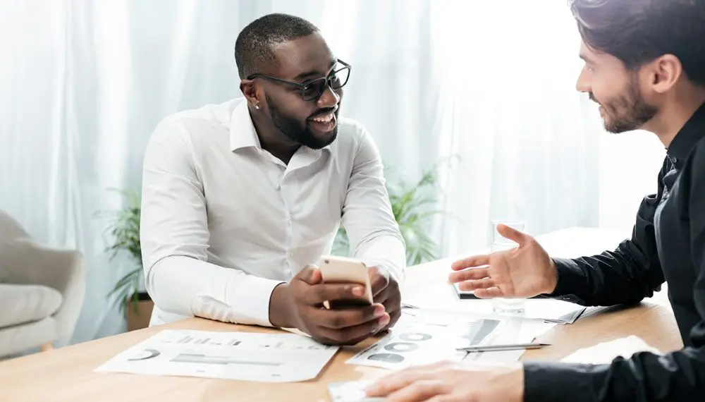 Client talking to an advisor about emergency funds