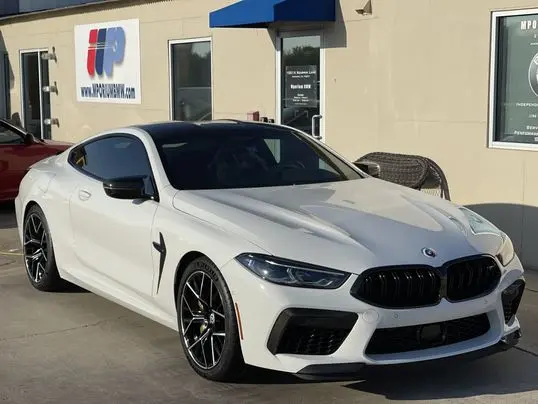 BMW in front of Mporium in North Texas