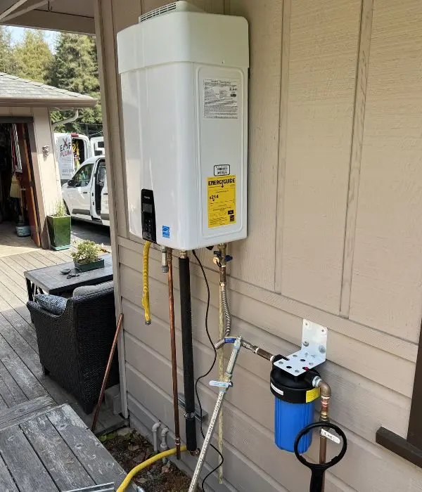 Plumber installing a tankless water heater in a residential home | Tankless Water Heater Repair and Installation