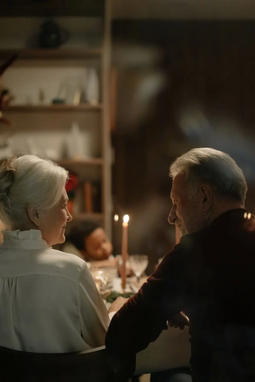 back view of elderly man and woman looking at each other
