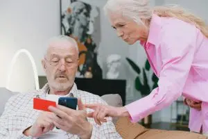 a woman and a man making an online purchase