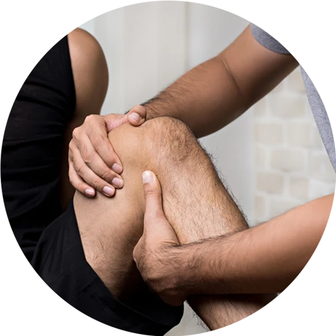 man getting physical therapy for his knee