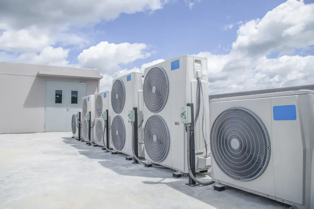 How to Choose the Right HVAC System for Your Home or Business - Several HVAC systems on a business rooftop.