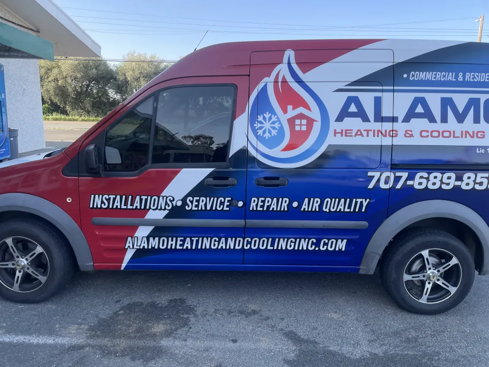 Picture of the company van with branding wrap applied.