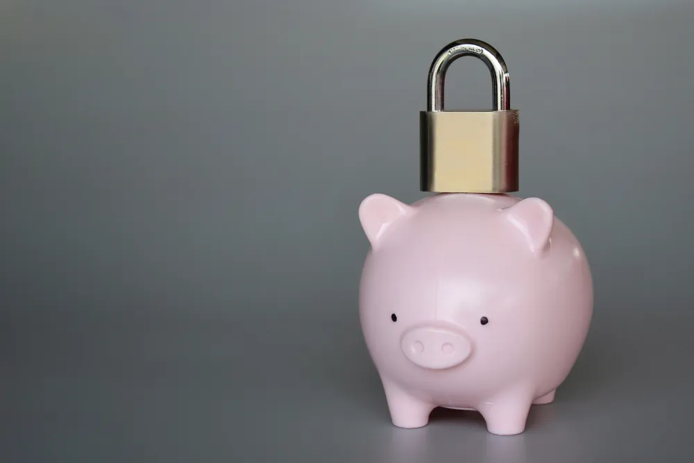 a piggy bank with a lock on top