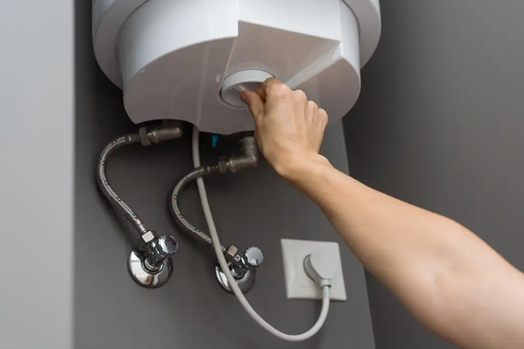 Electric water heater being maintained