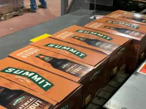 Summit Oatmeal Stout 12pk bottle box along line.