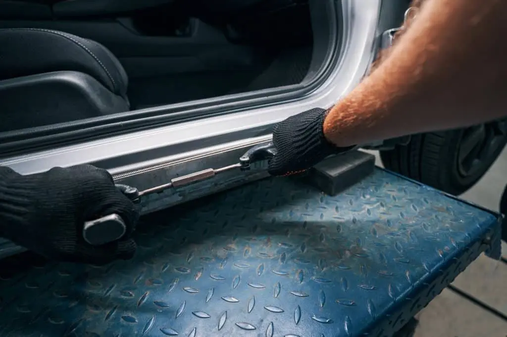 Straightening of car frame surface with peening instrument