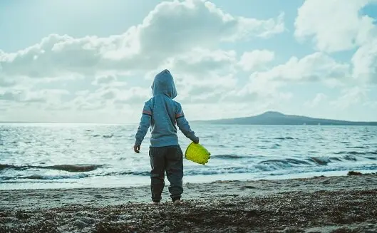 Little Boy at Beach on his own