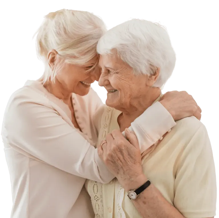 Woman smiling with elderly mother