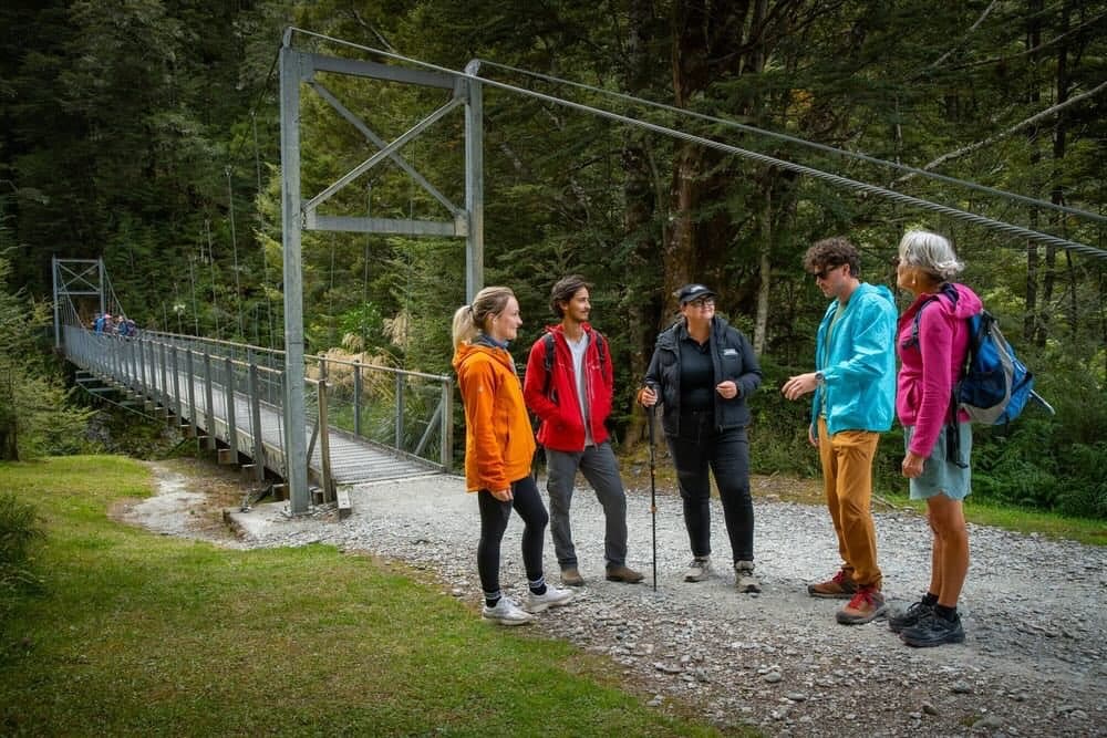 Guide and guests at the start of the Routeburn Track