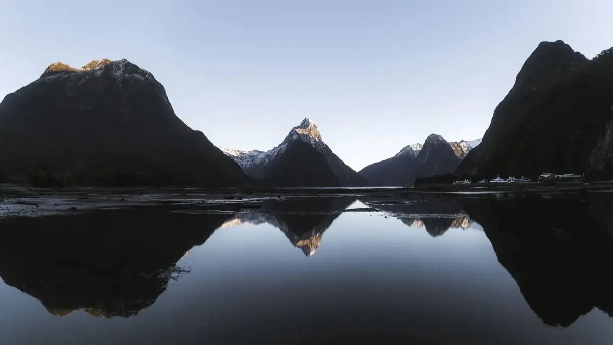 Mitre Peak reflected in still water at Milford Sound