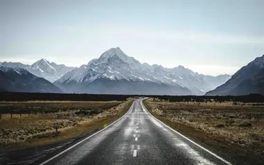 Straight road through the Mackenzie Country towards Aoraki Mount Cook