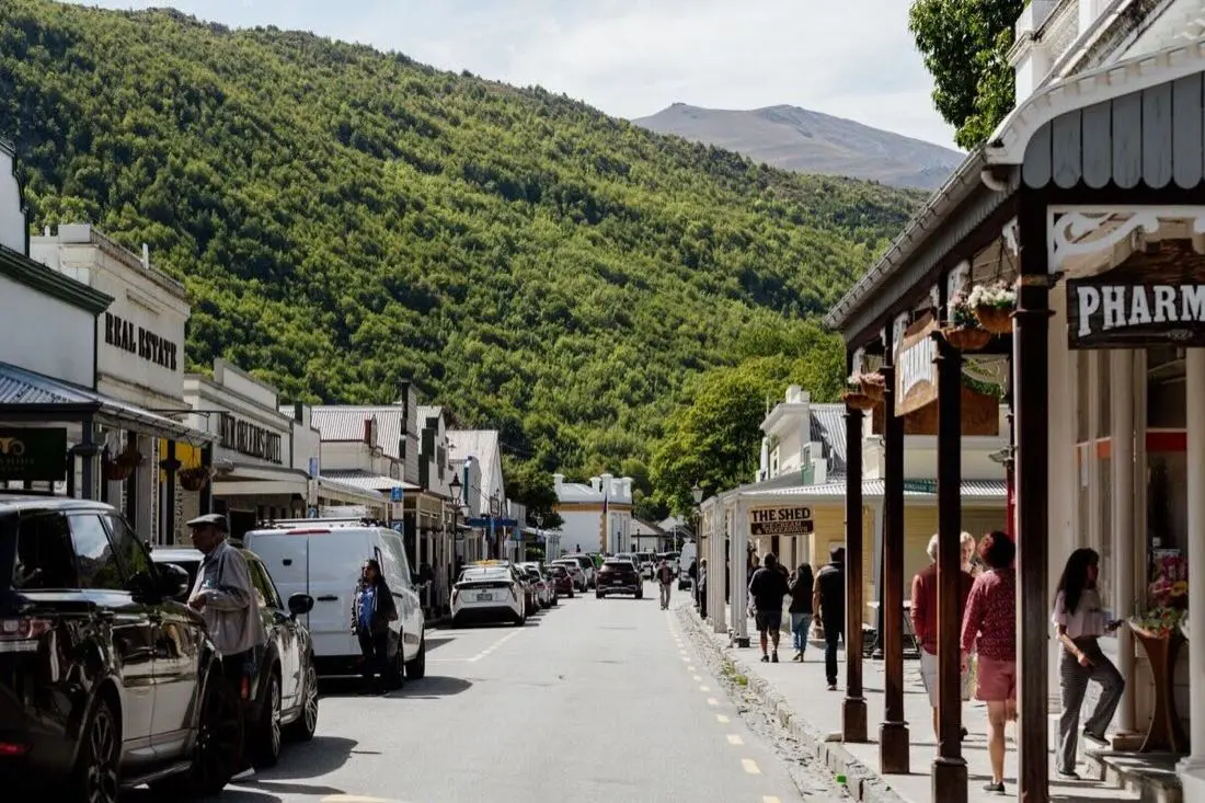 Buckingham Street, Arrowtown's historic main street, with shops and visitors