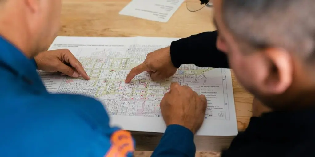 Transportation professionals reviewing project requirements, timelines, and deliverables to finalize the scope of a commuter transportation program | Finalize Scope